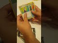 Opening a pack of Pokemon TCG in the Nintendo Store!