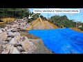 The ravine is covered with a giant tarpaulin to prevent landslides