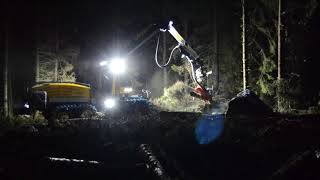 Delivery of a new forestry machine Eco Log 688E at night – harvesters service friendly cut to lenght