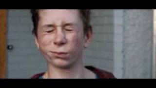 Geek getting slapped in the face on high speed camera.