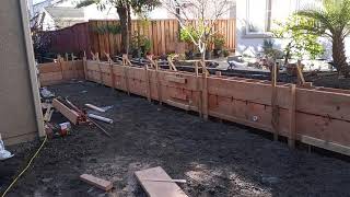 Veterans concrete,...progress @ fence wall / weep holes, chamfer strip, formwork