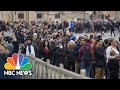 Thousands gather in Vatican City as Pope Emeritus Benedict XVI lies in state