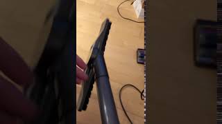 Articulating hard floor tool falling off of wand