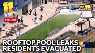 Baltimore rooftop pool leaks, residents evacuated