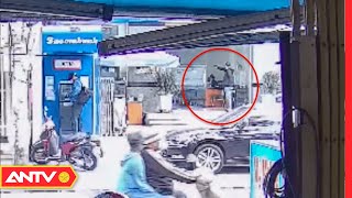 Điều tra vụ hai thanh niên nghi vào ngân hàng Sacombank chĩa súng rồi bỏ đi | ANTV