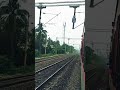 crossing with sealdah naihati memu passenger after ichhapur railway station on kolkata suburban.