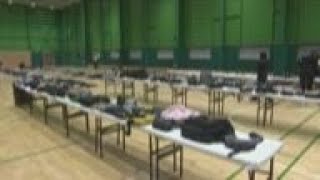 Crowd surge belongings laid out in Seoul sports hall