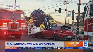 SUV lands on Tesla during wild Fountain Valley crash