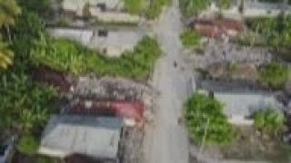 Haitians scour rubble for belongings after quake