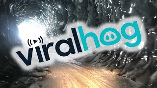 Exploring a Beautiful Naturally Crafted Ice Tunnel || ViralHog