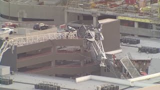 RAW VIDEO: During storms, crane falls onto apartment complex in downtown Dallas