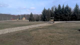 Dad Breaking up the shale stone with the dozer