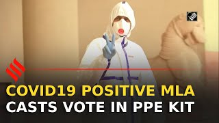 RS Polls 2020: Covid19 positive congress MLA casts vote wearing PPE kit