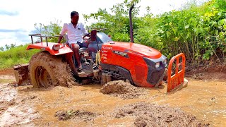 Kubota Mu4501 4Wd tractor stuck in mud Rescued by Mahindra yuvo tractor