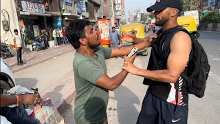 Taking Peoples Phones In INDIA!  *I GOT JUMPED*