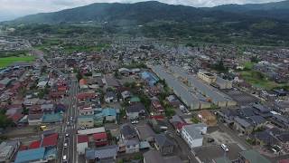 空撮　4ｋ　2016福島県　桑折町　諏訪神社と西町街並みと建物火災