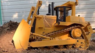 True Grit! Dozer action /DXR2 1/14 hydraulic Bulldozer shows Grit during earth moving operations.