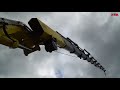 huge crane in the french alps hyvacrane on man in action