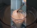 Blending ice cream with Nutella in a blender for a Nutella shake