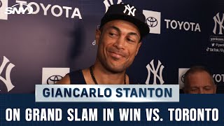 Giancarlo Stanton reacts to his grand slam in the Yankees' win against Toronto |