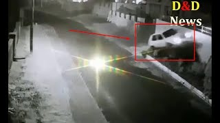 EXTREMELY CCTV Footage- Car capsize after driving into hedge