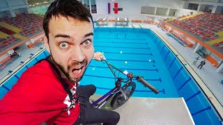 BMX vs. Olympic height (33 ft.) | Bicycle tricks and FAILS at the swimming pool