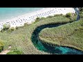 Beach Almyros, Agios Nikolaos best beach, 4K Drone Footage, Crete, Greece