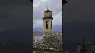 Ringing of the bells with a view of the lake during a storm