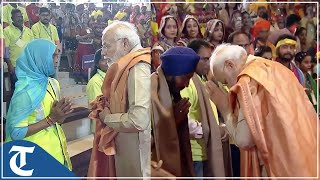 PM Modi felicitates, interacts with Shramjeevis at ITPO complex in Pragati Maidan