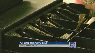 7 wanted in counterfeit check ring