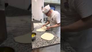 Pizzas being made at Pizzeria Brandi, Naples.