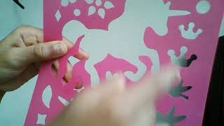I got a new unicorn stencil kit book with coloring pages and cool rainbow papers.