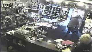 KNIFE ROBBER and SHOPKEEPER IN FIERCE FIGHT -- CAUGHT ON CCTV