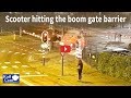 Scooter hitting boom gate barrier on RailCam crossing