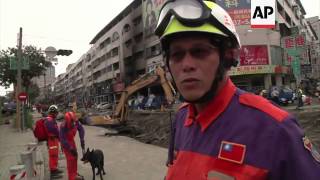 Firefighters pick through wreckage following deadly gas explosions