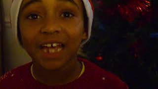 Boy sings Christmas song