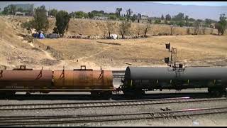 UP 8536 Leads Eastbound Intermodal Train meets UP 8725 Manifest Train at West Colton Yard