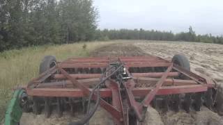 Discing a Plowed Field