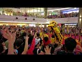 high poles lion dance performance in singapore chinese new year lion dance 2023 compass one