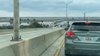 Log truck crash slows traffic on Talmadge Bridge