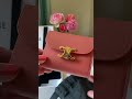 unboxing celine wallet in the color lychee.