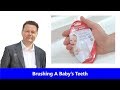 Brushing Baby's Teeth - How to use baby's first toothbrush