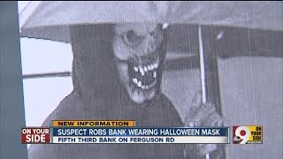 Bank robber wears Halloween mask