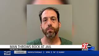 Man arrested in Morgan County after throwing rock through jail door