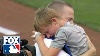 Military dad surprises son after first pitch in Kansas City