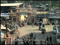 Perfect harmony - Hindu Devotees dance by a mosque - India