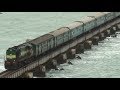 Train Crossing Pamban Bridge On A Windy Day