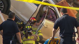 WATCH THE RESCUE: Woman trapped inside vehicle