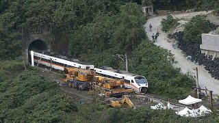 Taiwan prosecutors seek arrest of lorry driver as train crash death toll rises to 50