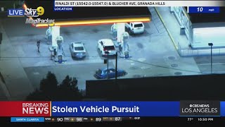 Suspect pulls into gas station, CHP officer arrives